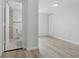 This bedroom features wood-look floors and an ensuite bathroom with marble tile at 2652 26Th St, Sarasota, FL 34234