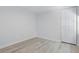 This is a simple bedroom with new flooring and a large closet for optimal storage at 2652 26Th St, Sarasota, FL 34234