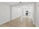 Bright living room featuring hardwood floors and an open view to the modern kitchen at 2652 26Th St, Sarasota, FL 34234
