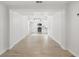 Bright living room featuring hardwood floors and an open view to the modern kitchen at 2652 26Th St, Sarasota, FL 34234