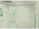 Bright hallway featuring a minimalist design with white walls and doorways to other rooms at 2702 45Th S St, Gulfport, FL 33711