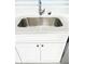 Close-up of a kitchen sink with quartz countertops and a new faucet at 2702 45Th S St, Gulfport, FL 33711