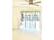 Bright living room boasts tile floors, ceiling fan, and glass doors to the outdoor patio at 2702 45Th S St, Gulfport, FL 33711