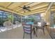 Covered patio with dining area, ideal for outdoor entertaining overlooking the pool at 2702 45Th S St, Gulfport, FL 33711