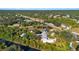 Beautiful aerial view of the property with surrounding foliage and access to the canal and waterfront at 31 Twig Ct, Port Charlotte, FL 33954