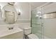 Bathroom showcasing a glass shower, stylish vanity, and modern fixtures at 31 Twig Ct, Port Charlotte, FL 33954