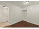 Bedroom with hardwood floors, a closet, and neutral walls at 31 Twig Ct, Port Charlotte, FL 33954