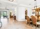 Open concept dining area with decorative tile flooring, a chandelier, and lots of natural light at 312 148Th Ne Ct, Bradenton, FL 34212