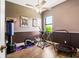 Home gym with lots of different fitness machines, a window, and ceiling fan at 312 148Th Ne Ct, Bradenton, FL 34212