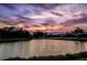 Scenic view of the serene lake in the community at sunset at 312 148Th Ne Ct, Bradenton, FL 34212