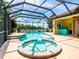 Gorgeous pool and spa with lake views in screened enclosure, complete with outdoor bar at 312 148Th Ne Ct, Bradenton, FL 34212
