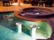 Outdoor pool with in-pool barstools, perfect for relaxation and entertainment at 312 148Th Ne Ct, Bradenton, FL 34212