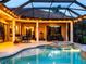 Stunning outdoor pool and spa, perfect for entertaining at night at 312 148Th Ne Ct, Bradenton, FL 34212