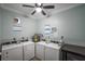 On-site laundry room featuring multiple washers and dryers for resident convenience at 3253 Beneva Rd # 103, Sarasota, FL 34232