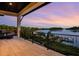 Spacious covered balcony with stunning water views, ideal for outdoor lounging and relaxation at 3799 Flamingo Ave, Sarasota, FL 34242