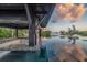 Outdoor bar with bar-top seating with clear views of the sea and the surrounding greenery at 3799 Flamingo Ave, Sarasota, FL 34242