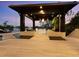 Stunning covered outdoor space with dining and seating areas overlooking the waterfront at 3799 Flamingo Ave, Sarasota, FL 34242