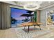 Recreation room with ping pong table and beautiful sunset views at 3799 Flamingo Ave, Sarasota, FL 34242