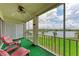 Breezy screened balcony offers views of the lush landscaping and tranquil lake, a great spot to unwind at 3801 Lake Bayshore Dr # H413, Bradenton, FL 34205