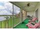 Relax on this screened balcony with outdoor seating and gorgeous views of the lake and green spaces at 3801 Lake Bayshore Dr # H413, Bradenton, FL 34205