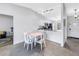 Cozy dining area with seating for four, located adjacent to a modern kitchen at 4116 43Rd W Ave, Bradenton, FL 34205