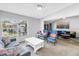 Bright living room features a large window, comfortable seating, and stylish decor at 4116 43Rd W Ave, Bradenton, FL 34205