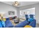 Cozy living room with stylish furnishings, a television, and seamless access to other living spaces at 4116 43Rd W Ave, Bradenton, FL 34205