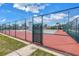 Community tennis court, enclosed and ready for a friendly match at 4116 43Rd W Ave, Bradenton, FL 34205