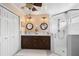 Bathroom features double sinks, modern lighting, and a glass enclosed shower at 4222 Lanai Dr, Sarasota, FL 34241