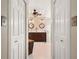 Bathroom with double sinks, and a glass enclosed shower at 4222 Lanai Dr, Sarasota, FL 34241