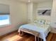 Comfortable bedroom with a built-in closet, ample natural light, and a relaxing atmosphere at 4412 125Th W St, Cortez, FL 34215
