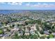 An aerial view shows the backyard pool and the home's proximity to nearby lakes and parks at 4603 4Th E Ave, Bradenton, FL 34208