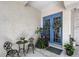 Charming front porch featuring double doors with decorative wreaths and inviting decor at 4603 4Th E Ave, Bradenton, FL 34208