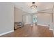 Open living space featuring hardwood floors and arched openings to other rooms at 4603 4Th E Ave, Bradenton, FL 34208