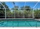 A screened in pool with fountains enhances the backyard oasis with its soothing sounds and refreshing ambiance at 4603 4Th E Ave, Bradenton, FL 34208