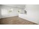 Open-concept living space with modern flooring and abundant natural light at 5045 10Th S Ave, Gulfport, FL 33707