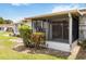 Backyard with screen enclosed lanai creating a perfect outdoor living space at 5062 White Oak Ct, Bradenton, FL 34207