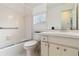 A clean bathroom with a shower-tub combo and an updated vanity at 5062 White Oak Ct, Bradenton, FL 34207
