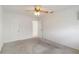 Bright bedroom features neutral carpet, ceiling fan, and easy access to the bath at 5062 White Oak Ct, Bradenton, FL 34207