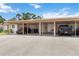 Carport with multiple parking spaces featuring ample room for vehicles and easy access to the home at 5062 White Oak Ct, Bradenton, FL 34207