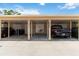 Carport with multiple parking spaces featuring ample room for vehicles and easy access to the home at 5062 White Oak Ct, Bradenton, FL 34207