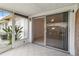 Screened lanai with tiled floor provides a bright transition between indoor and outdoor spaces at 5062 White Oak Ct, Bradenton, FL 34207