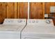 A dedicated laundry area with a washer and dryer offers convenience for household chores and organization at 5062 White Oak Ct, Bradenton, FL 34207
