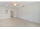 A light and bright living room with tile floors and an open kitchen at 5062 White Oak Ct, Bradenton, FL 34207