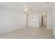 A spacious living room with tiled floors and natural light from the windows at 5062 White Oak Ct, Bradenton, FL 34207