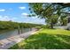 Backyard view of river with lush landscaping and kayak launch at 512 77Th St, Holmes Beach, FL 34217
