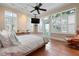 Serene bedroom with lots of natural light, tile floors, and access to the balcony at 512 77Th St, Holmes Beach, FL 34217