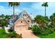 Lovely two-story home with lush tropical landscaping at 512 77Th St, Holmes Beach, FL 34217