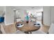 Cozy dining area adjacent to a modern kitchen, creating an inviting space for meals at 5125 Palm Aire Dr, Sarasota, FL 34243