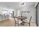 Dining area open to the kitchen, perfect for modern living and entertaining at 5125 Palm Aire Dr, Sarasota, FL 34243